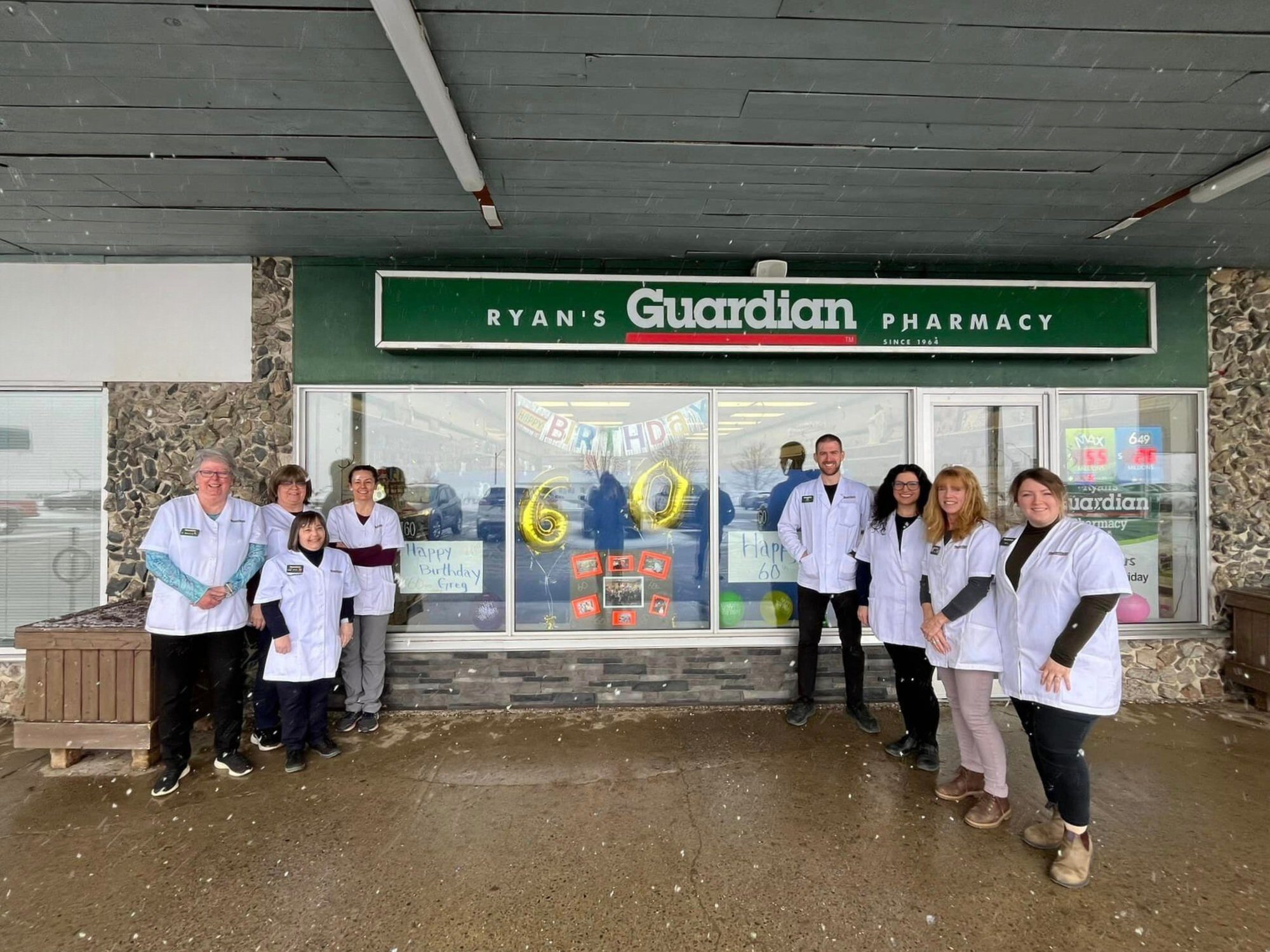 Ryan's Pharmacy team gathered outside the Nackawic storefront celebrating 60 years
