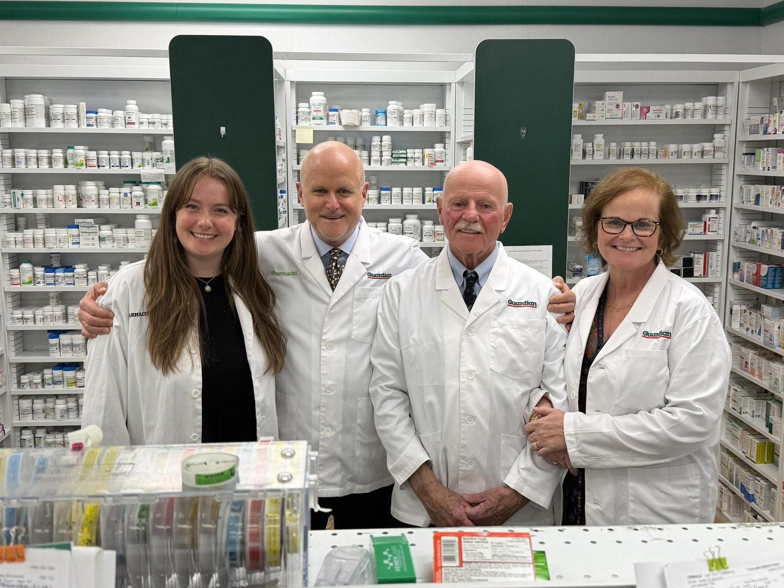 Three generations of the Ryan's Pharmacy team in the dispensary