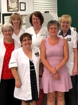 Ryan's Pharmacy staff group photo in the pharmacy